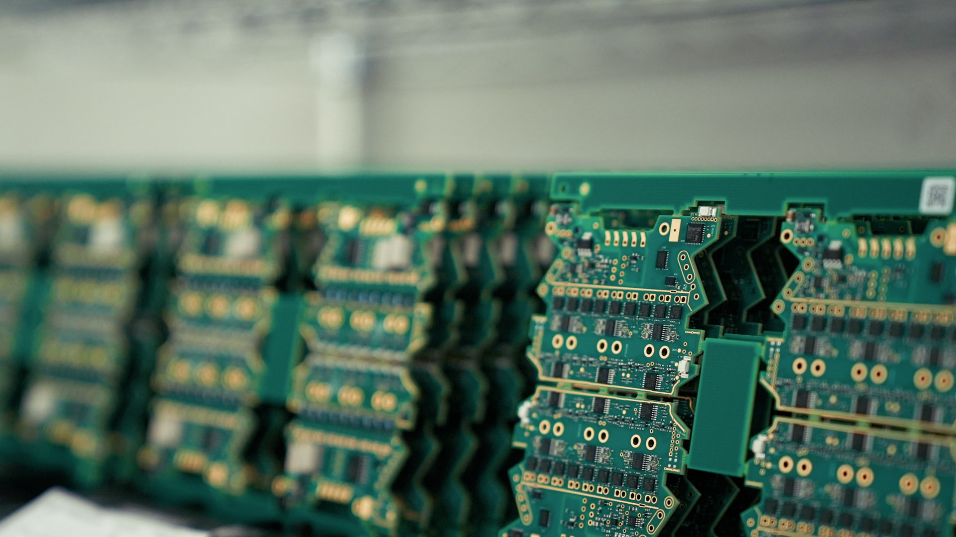 Circuit boards moving through production